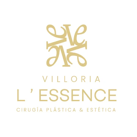 Logotipo dorado de Villoria L'Essence Cirugía Plástica y Estética
